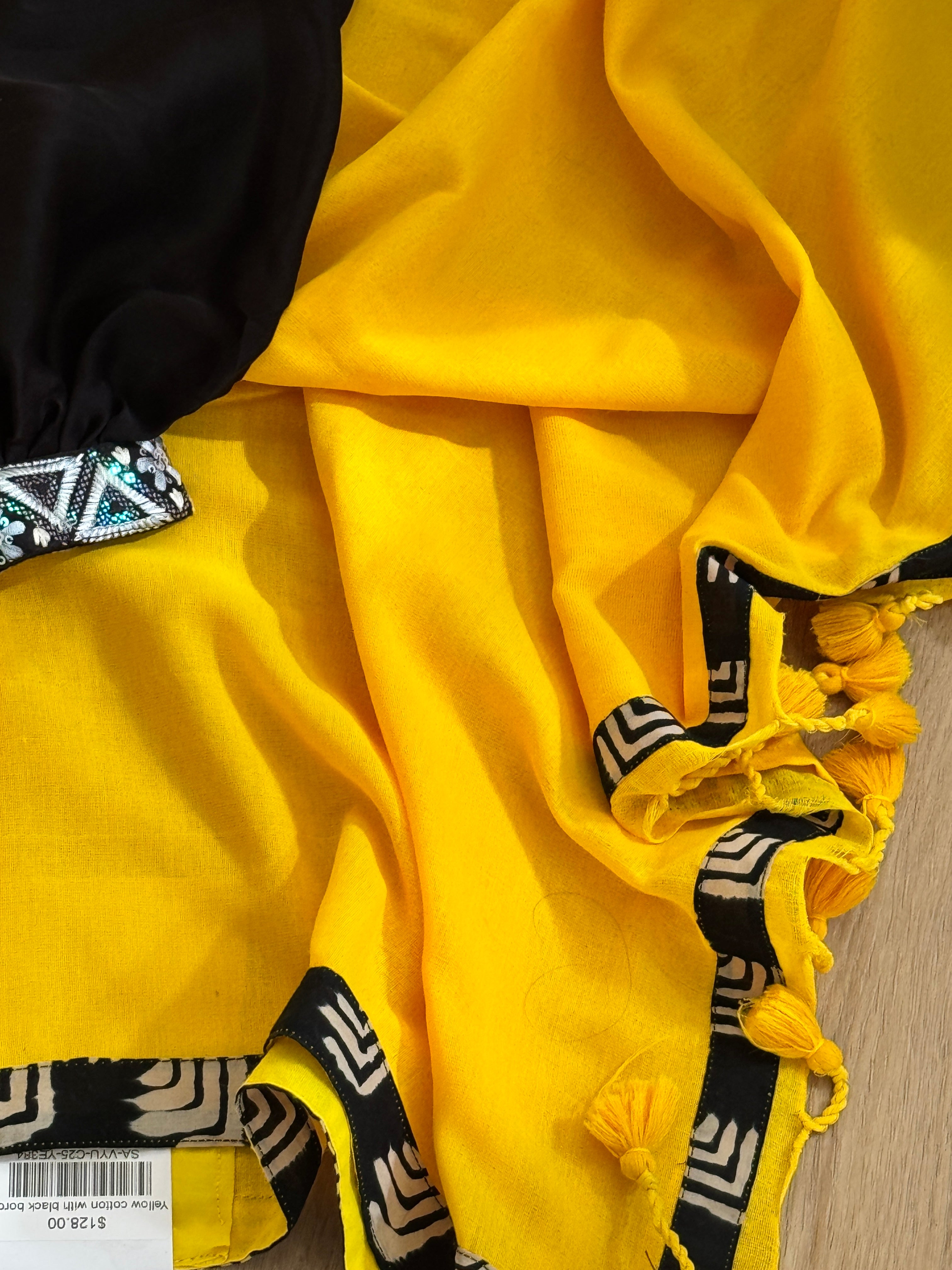 Yellow cotton with black border