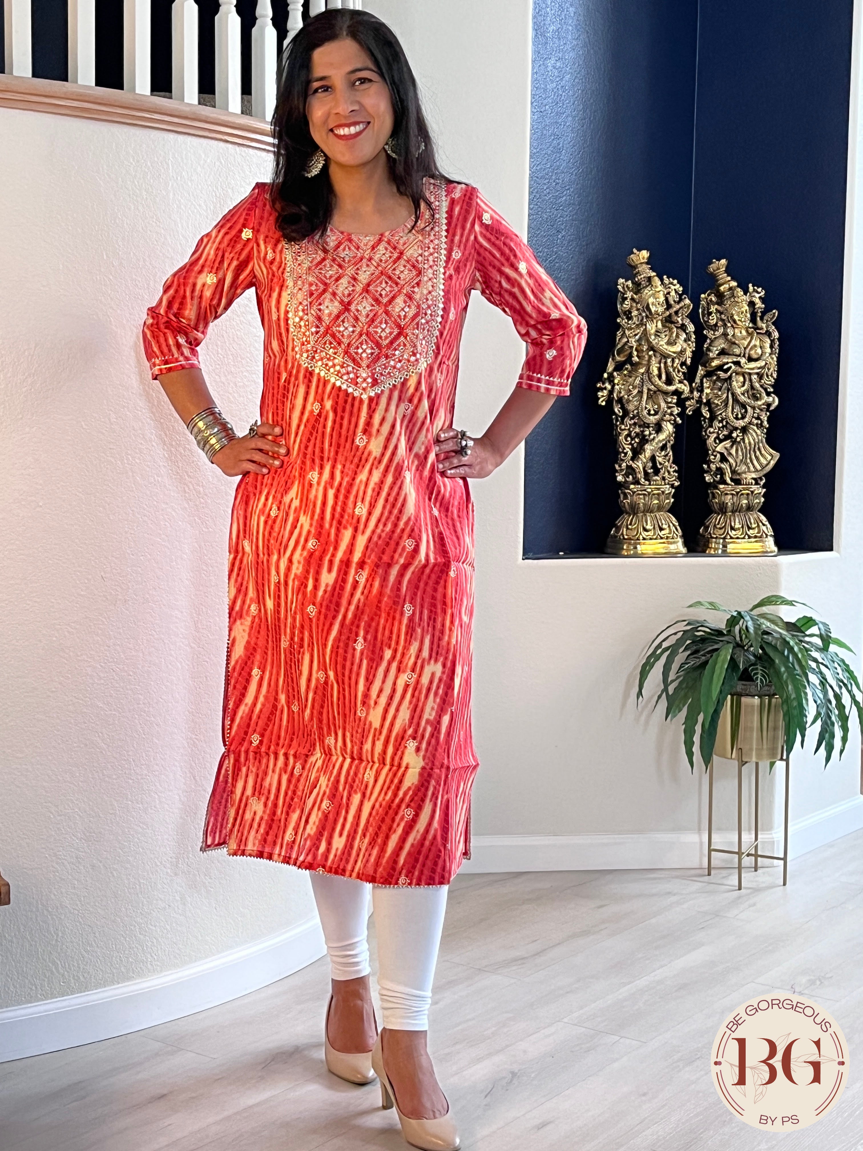 Beautiful kurti in gajri color with mirror and gota detailing