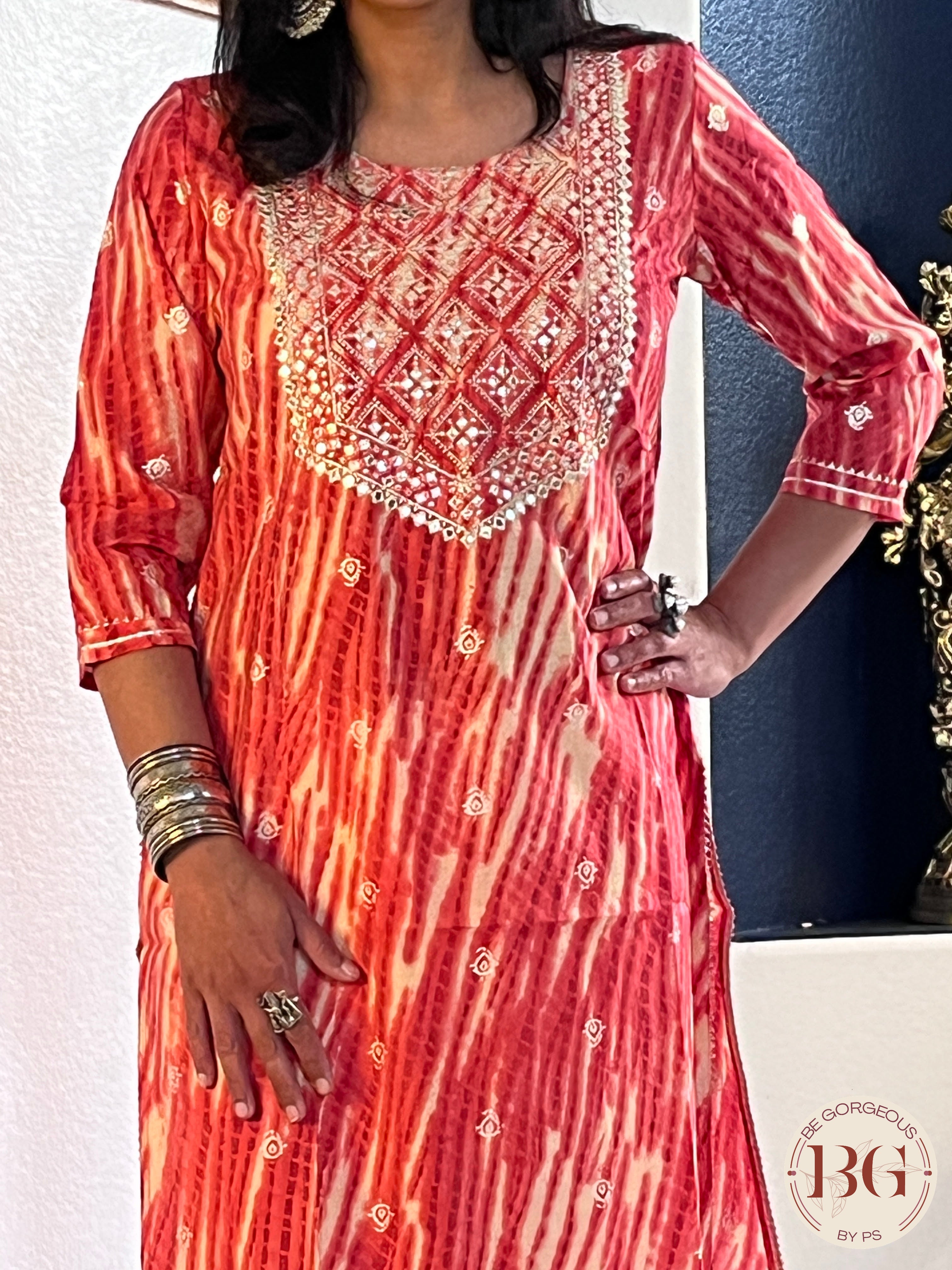 Beautiful kurti in gajri color with mirror and gota detailing