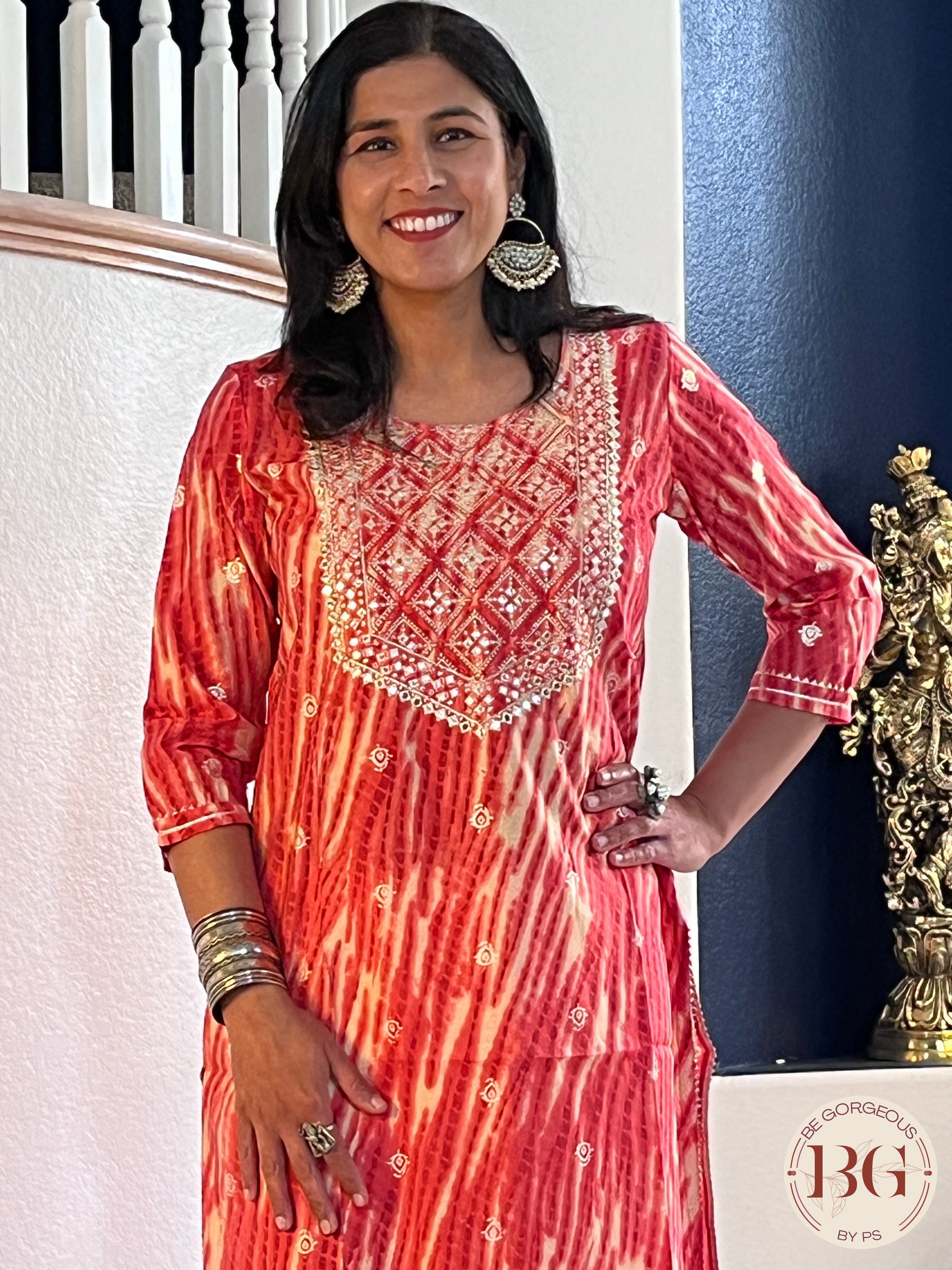 Beautiful kurti in gajri color with mirror and gota detailing