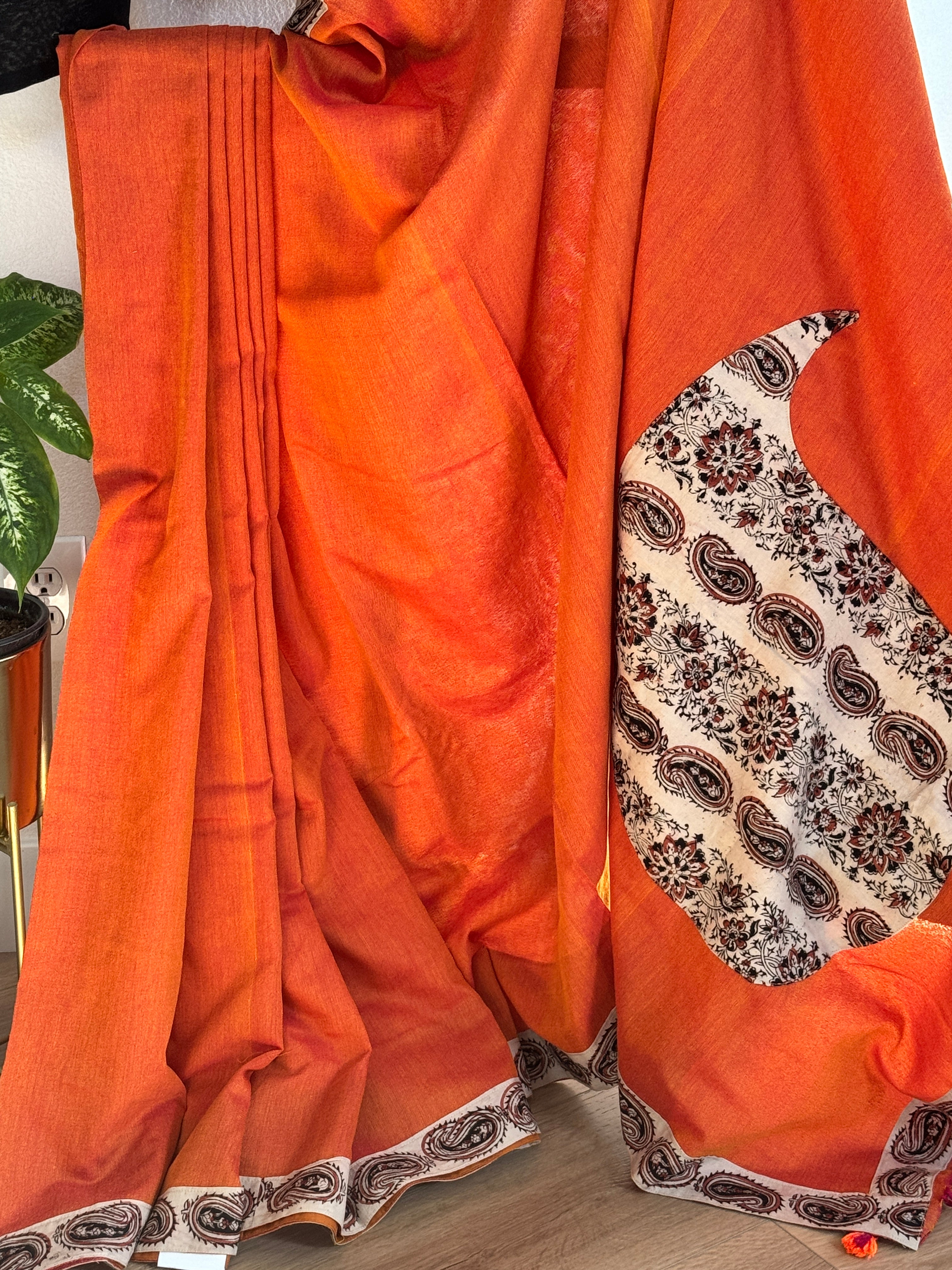 Orange cotton saree with mango border and pallu