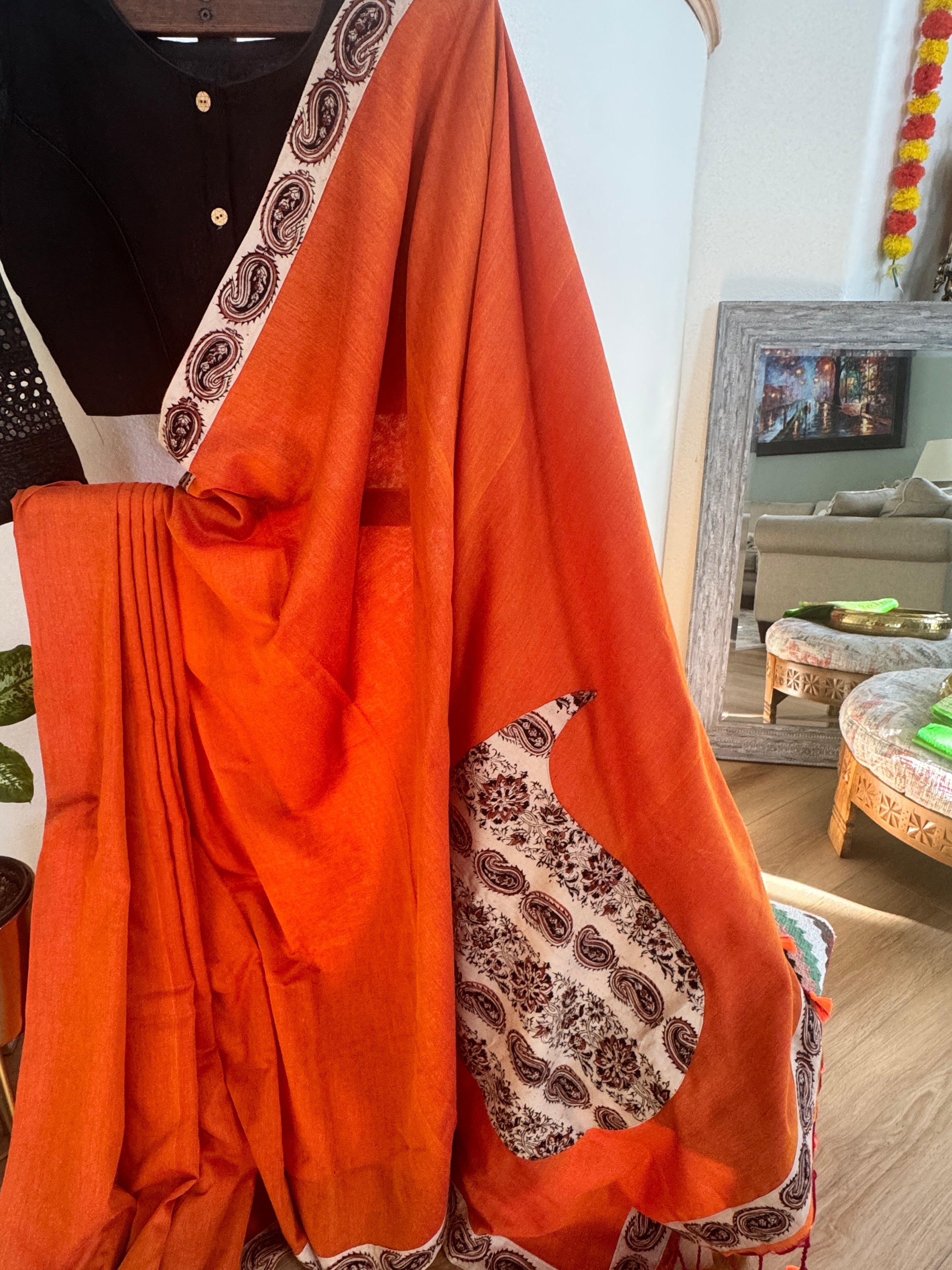 Orange cotton saree with mango border and pallu