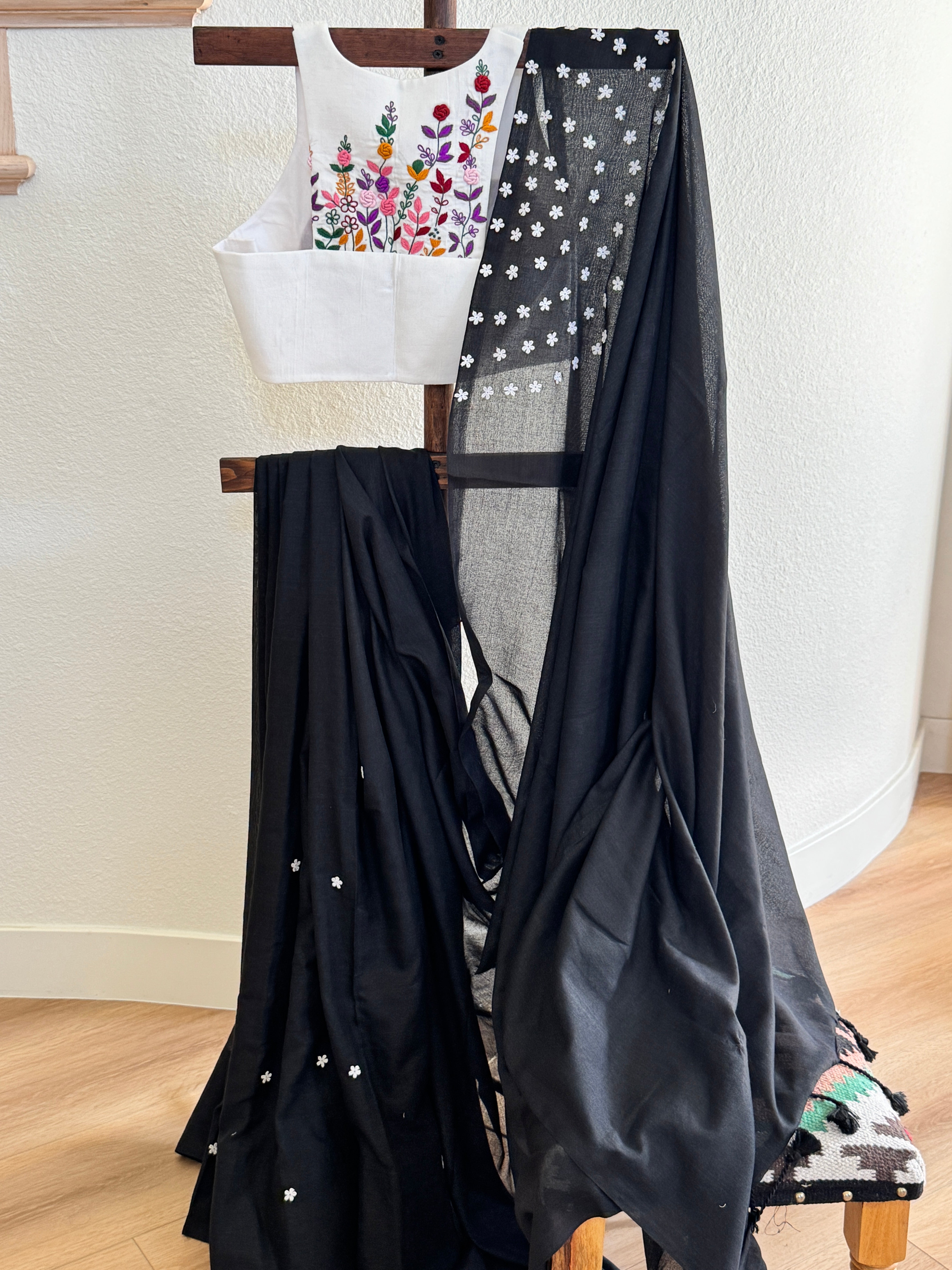 Black cotton with small white flowers