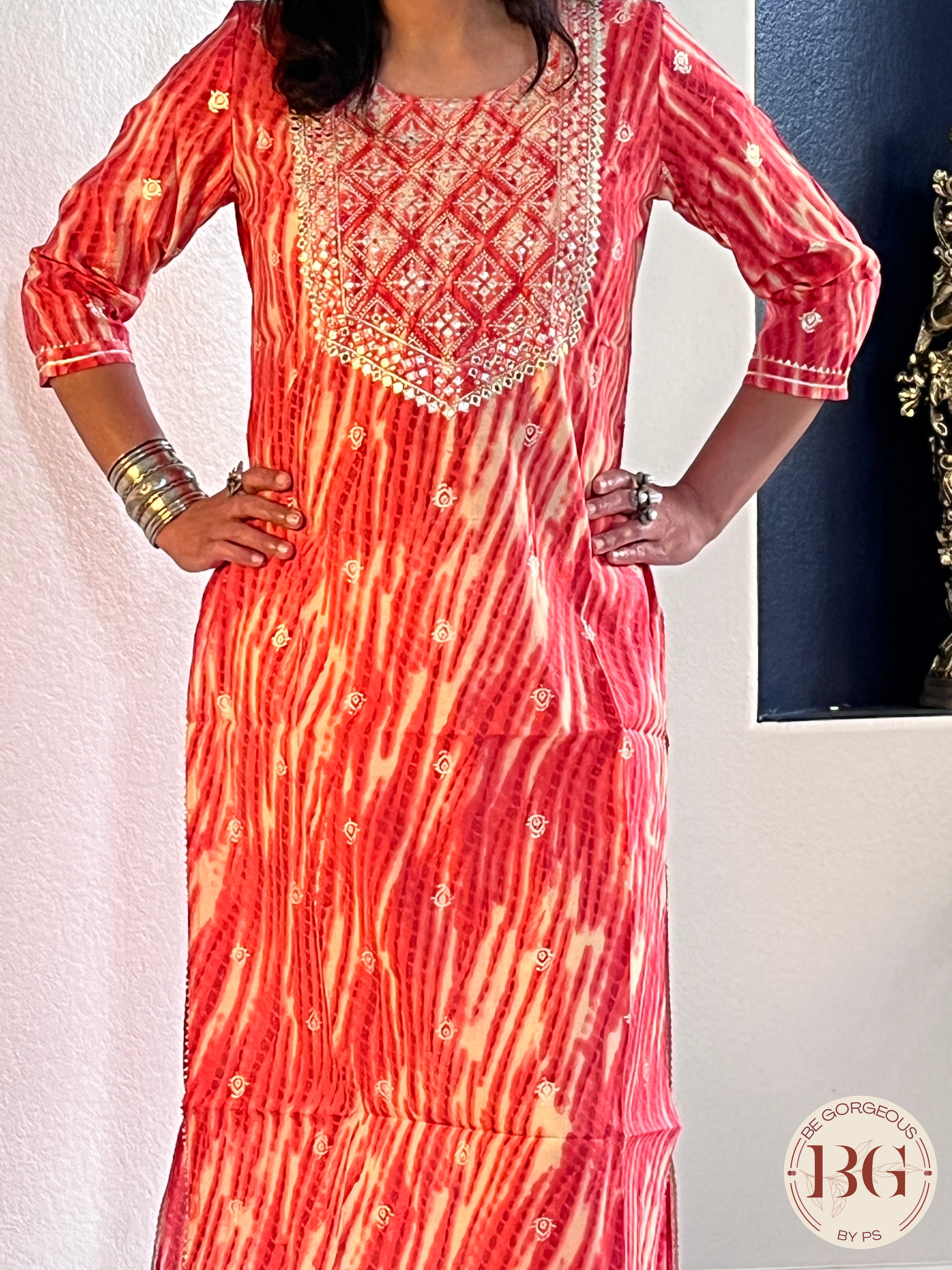 Beautiful kurti in gajri color with mirror and gota detailing