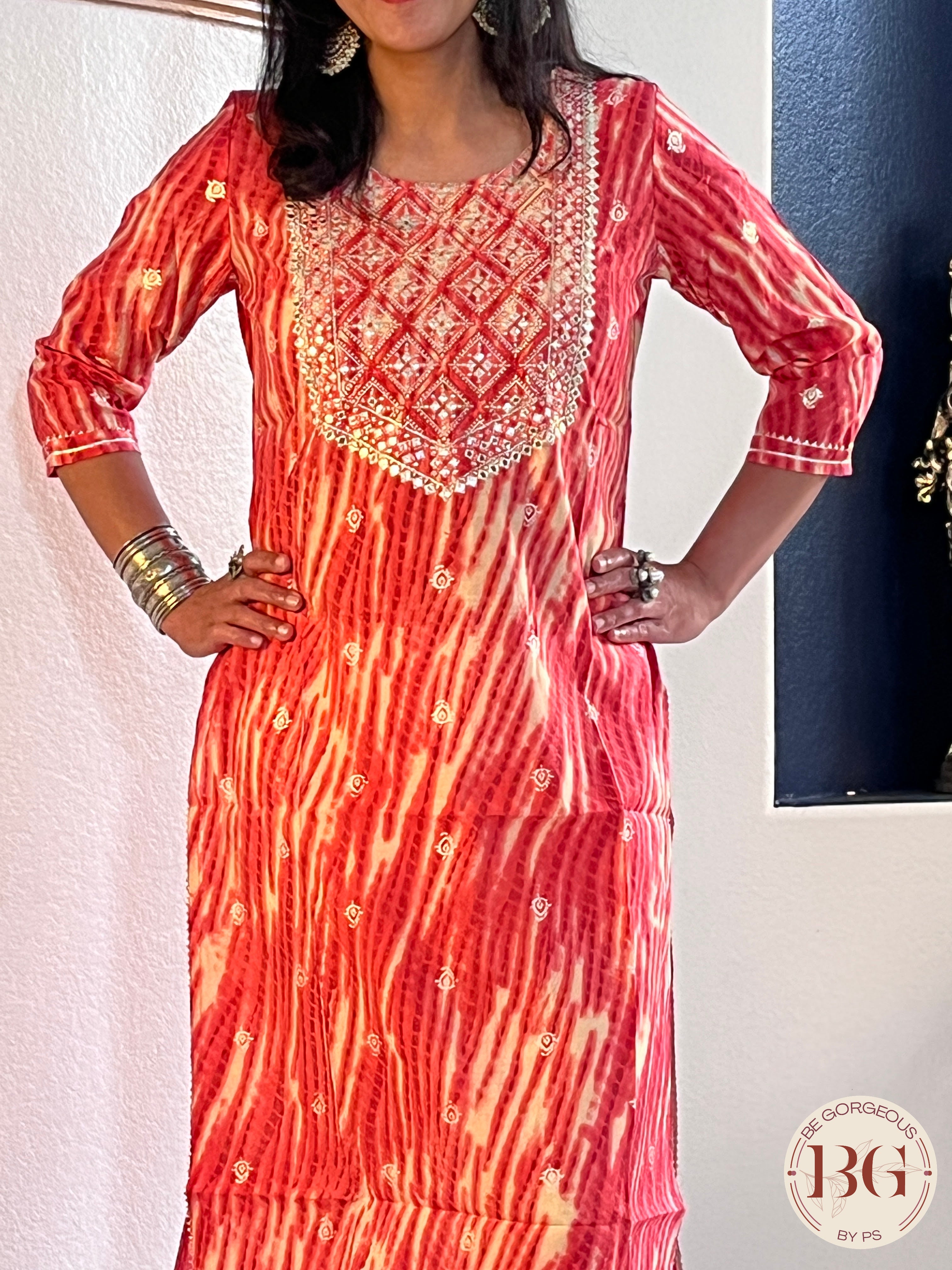 Beautiful kurti in gajri color with mirror and gota detailing