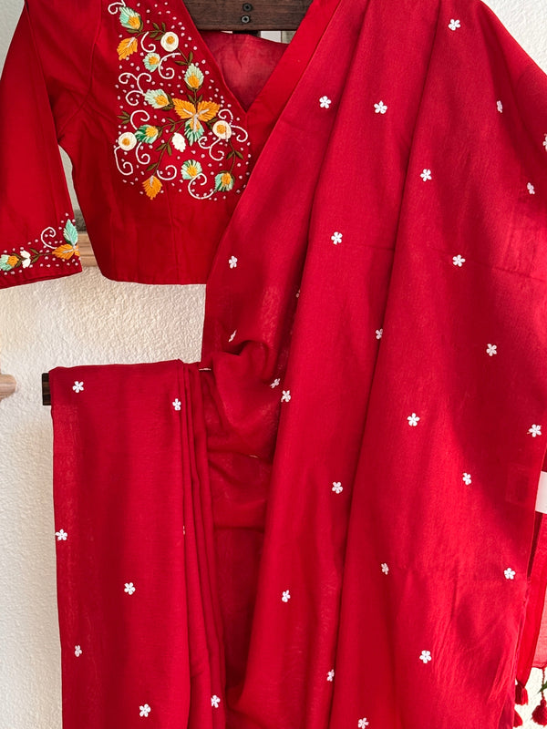 Red cotton saree with small white flowers