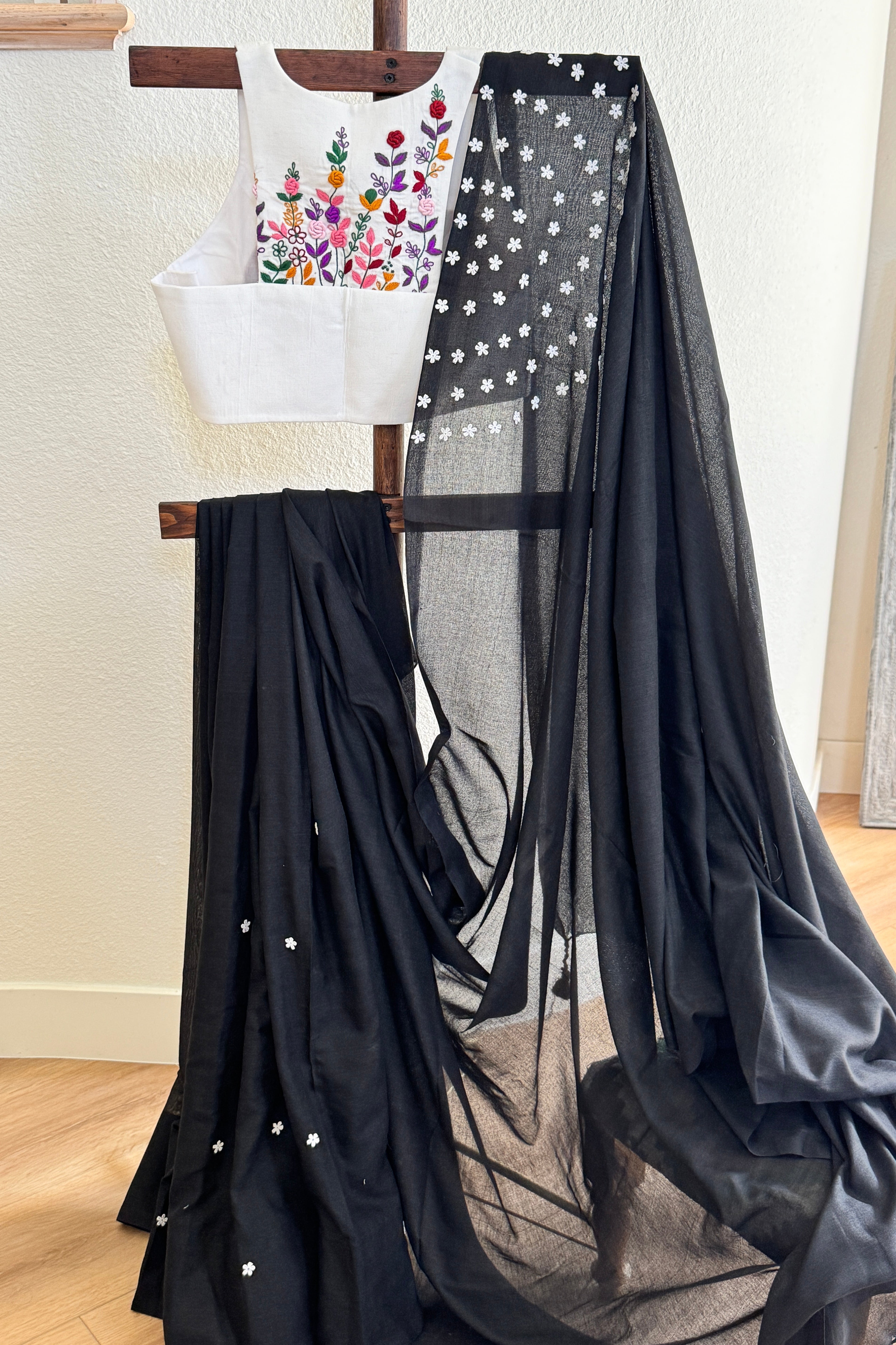 Black cotton with small white flowers