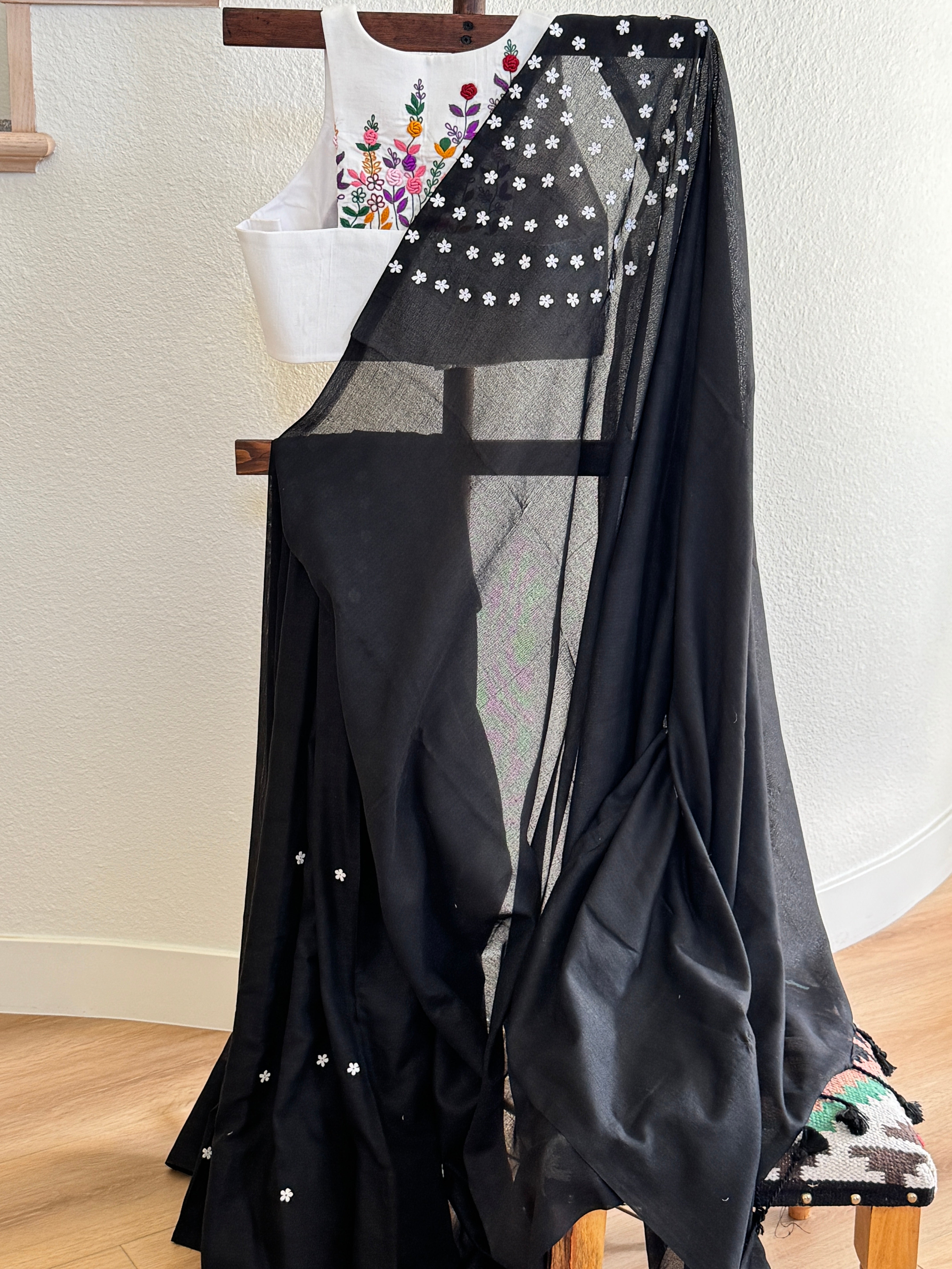 Black cotton with small white flowers