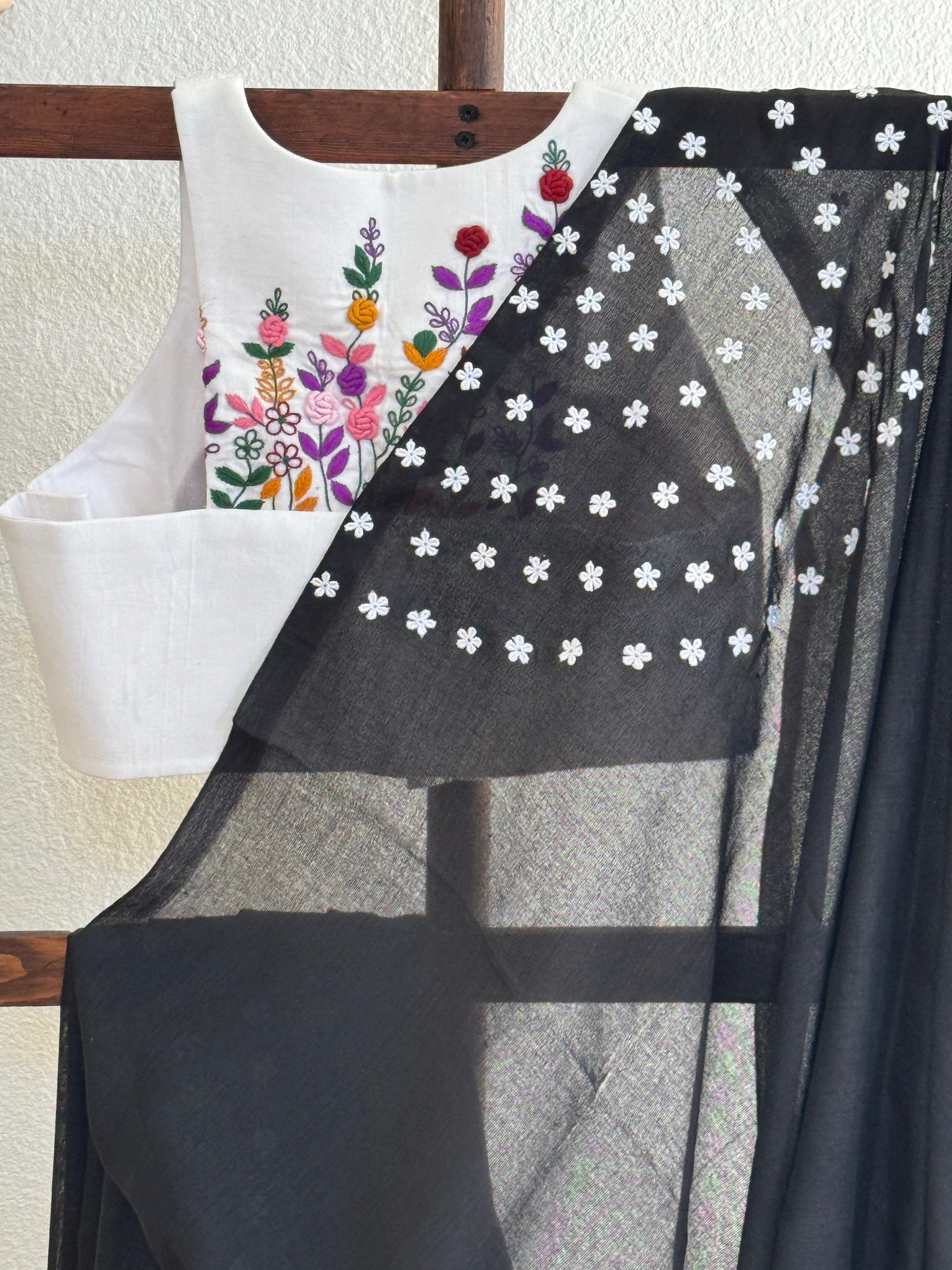 Black cotton with small white flowers