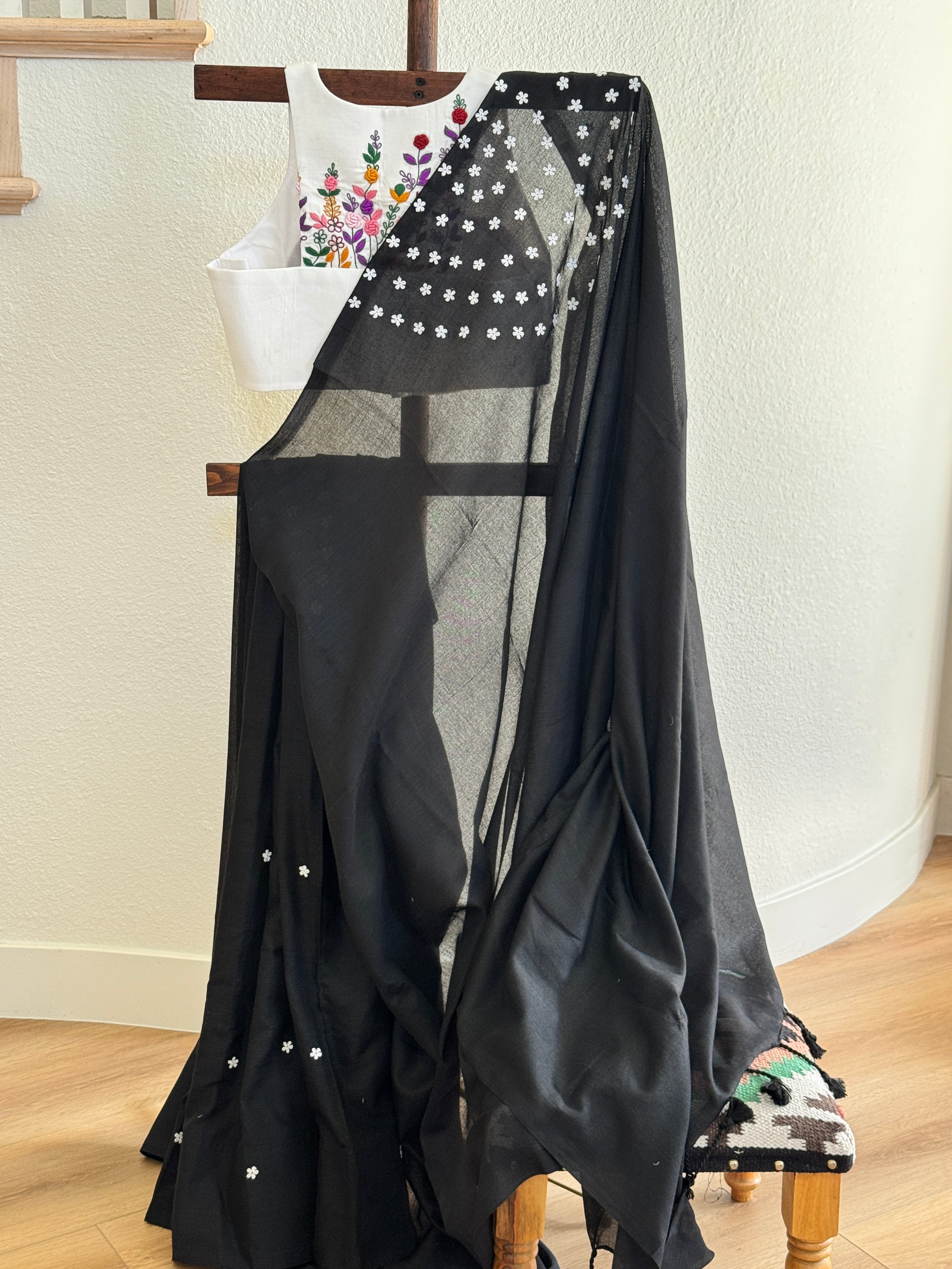 Black cotton with small white flowers