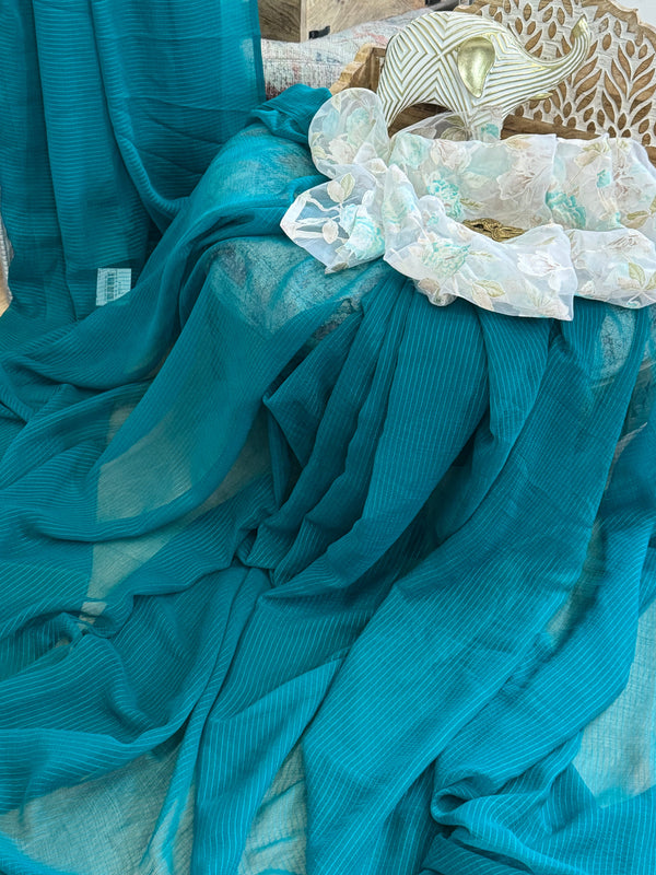 Green plain saree with printed blouse
