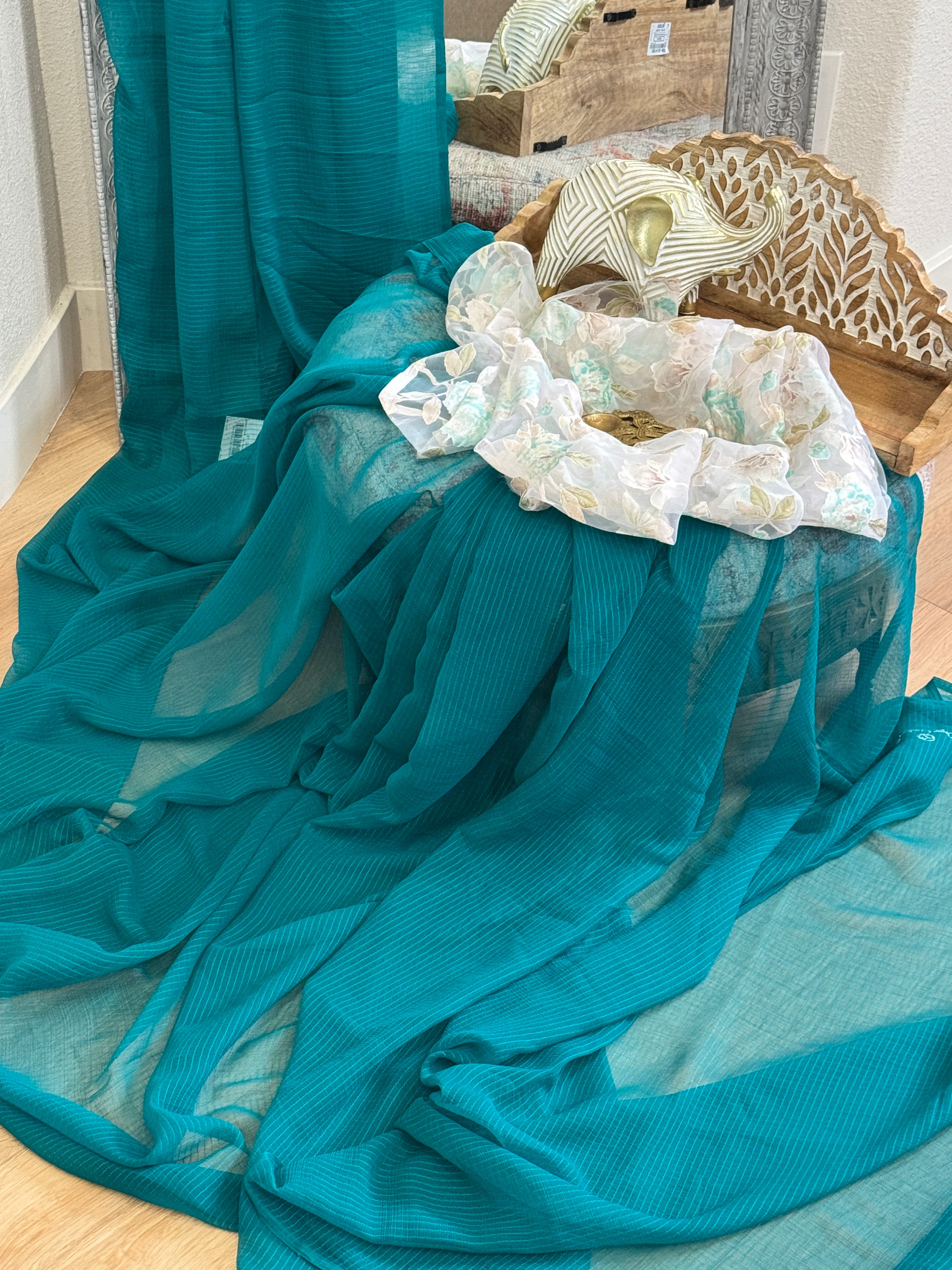 Green plain saree with printed blouse