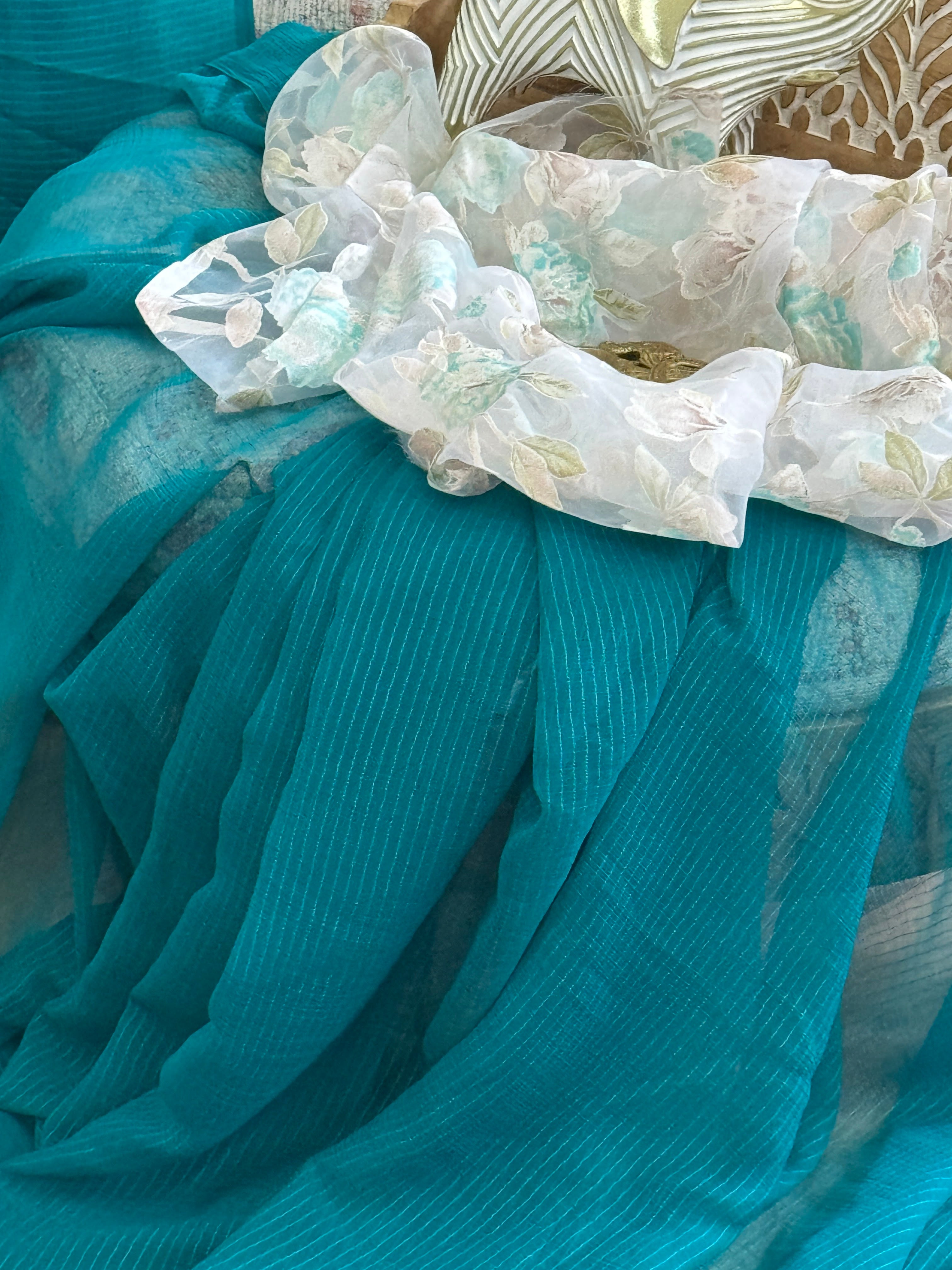 Green plain saree with printed blouse