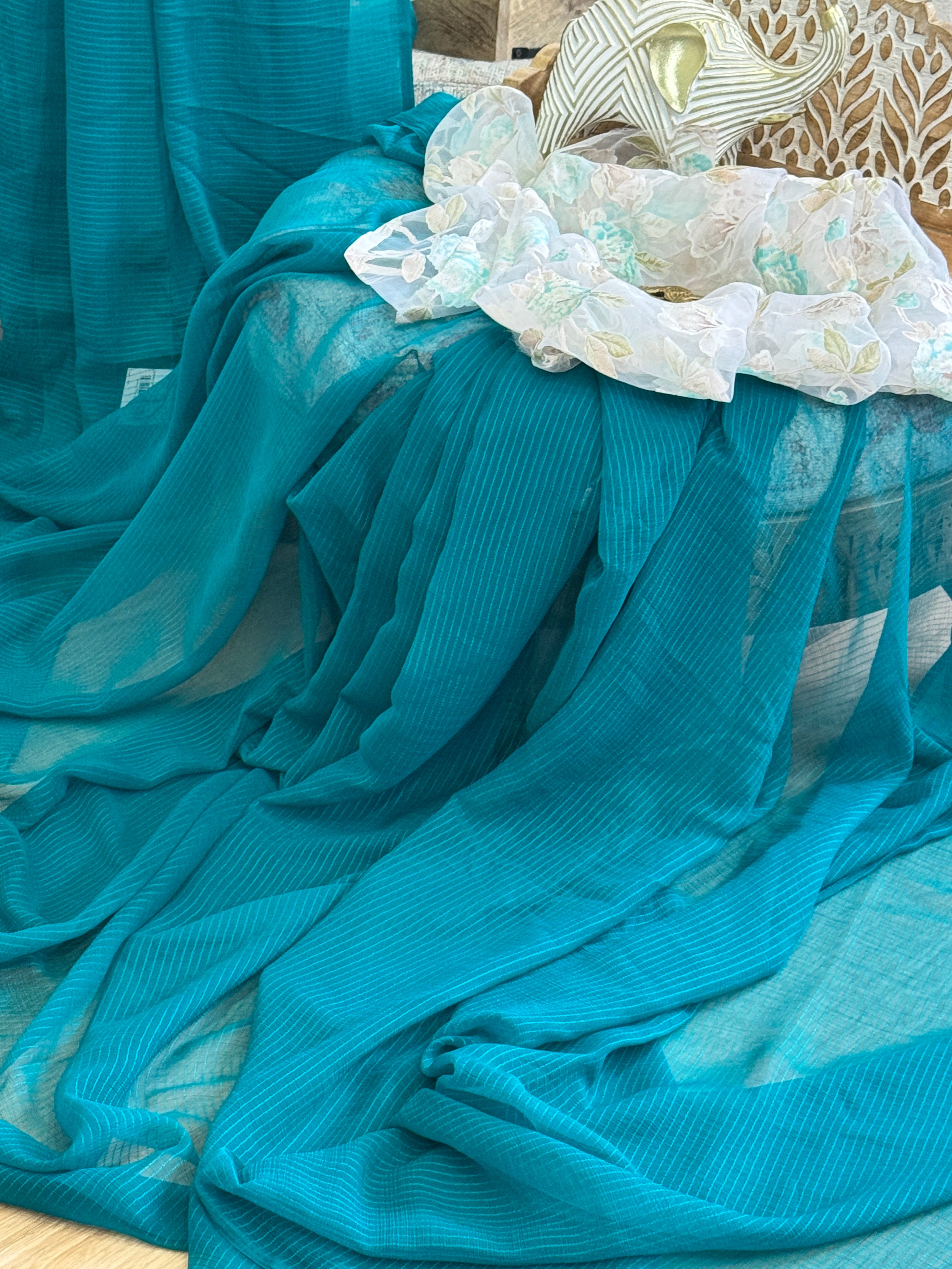 Green plain saree with printed blouse