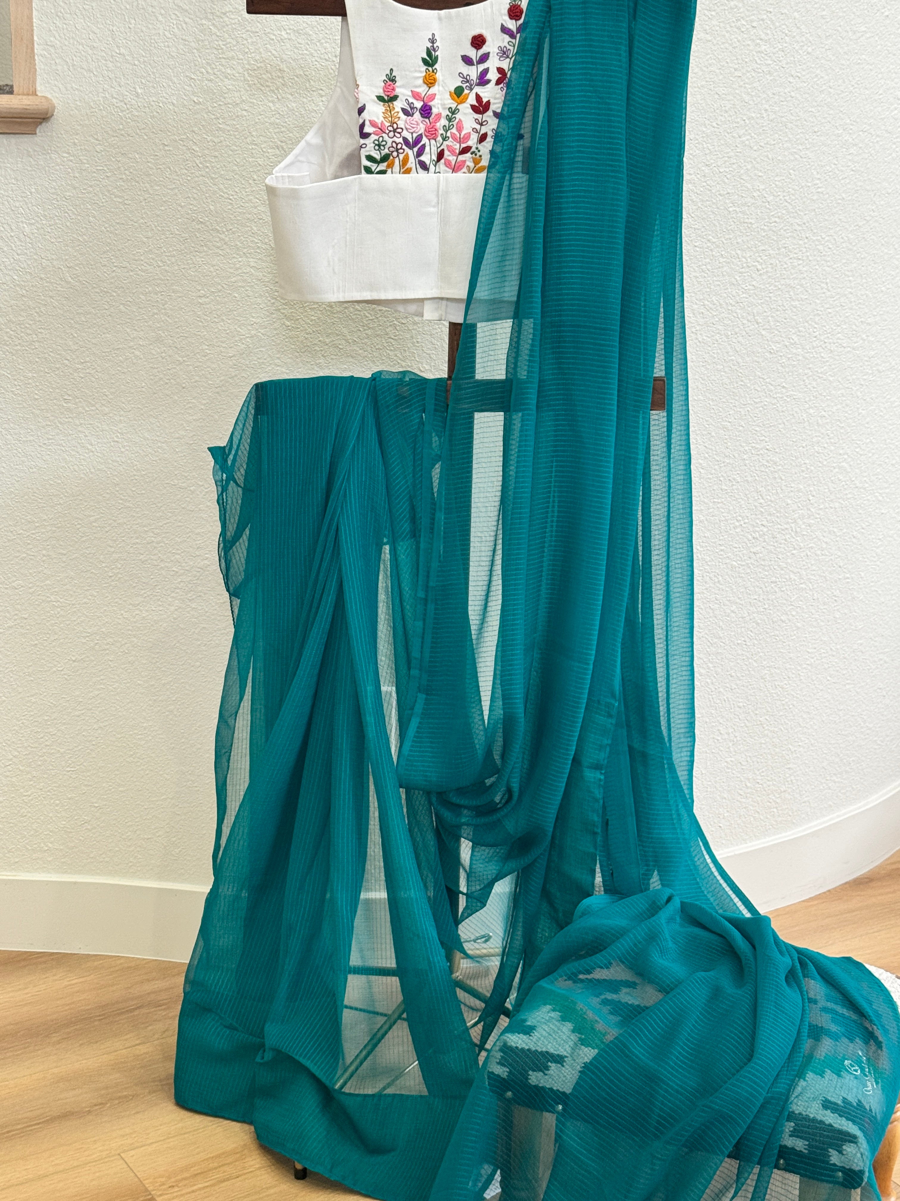 Green plain saree with printed blouse